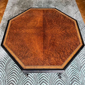 A Victorian marquetry & ebonised octagonal centre table in the Aesthetic manner by Alexander Mackenzie & Co, Glasgow.The top sees a rich burr wood veneer edged with fine blond wood marquetry, whilst underneath sees four turned ebonised legs with gold painted detailing and crossed bobbin stretchers - SHOP NOW - www.intovintage.co.uk