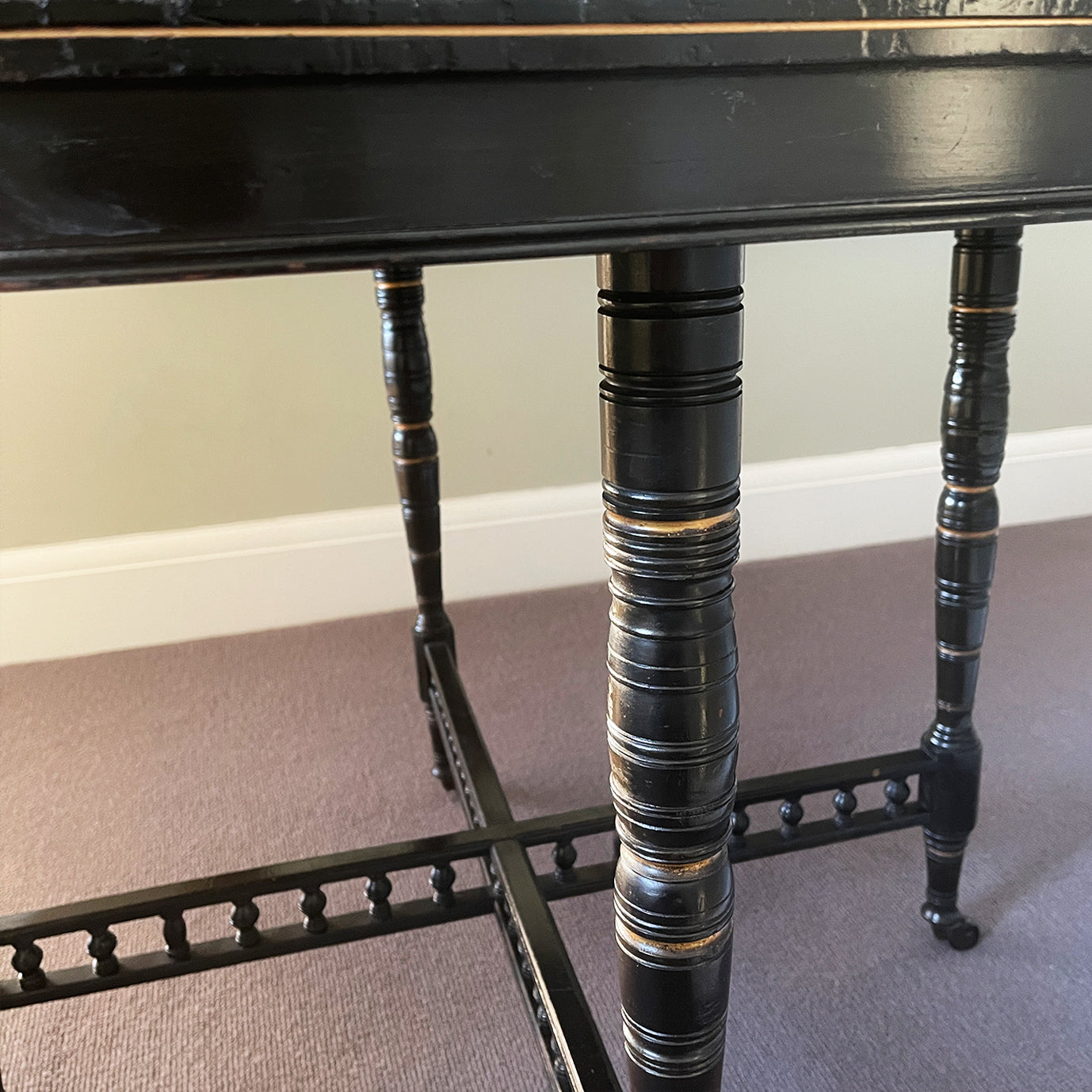 A Victorian marquetry & ebonised octagonal centre table in the Aesthetic manner by Alexander Mackenzie & Co, Glasgow.The top sees a rich burr wood veneer edged with fine blond wood marquetry, whilst underneath sees four turned ebonised legs with gold painted detailing and crossed bobbin stretchers - SHOP NOW - www.intovintage.co.uk