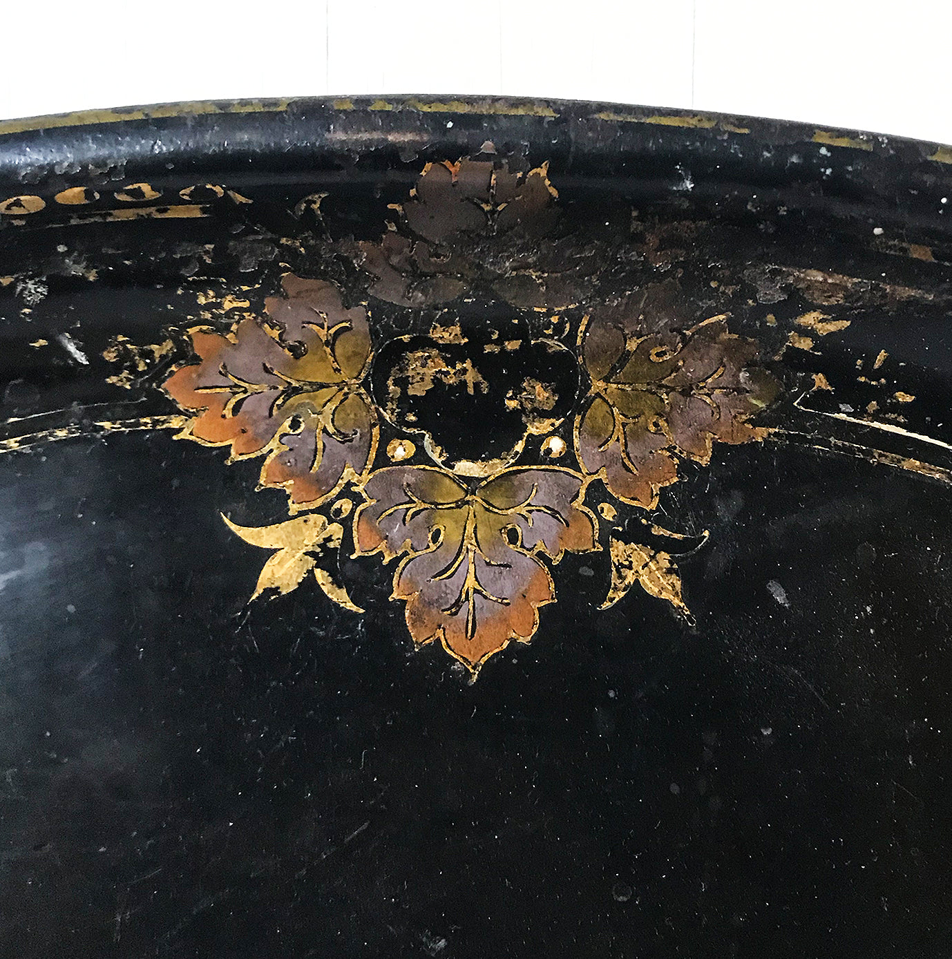 Beautifully aged Victorian Toleware Tray. A large metal tray finished in a beautifully designed gold border with vine leaves that has aged perfectly over the years - SHOP NOW - www.intovintage.co.uk