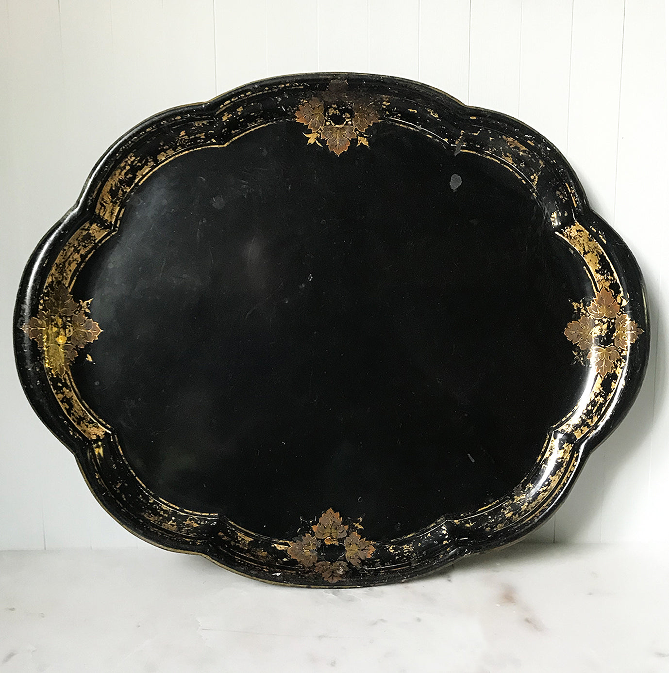 Beautifully aged Victorian Toleware Tray. A large metal tray finished in a beautifully designed gold border with vine leaves that has aged perfectly over the years - SHOP NOW - www.intovintage.co.uk