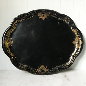 Beautifully aged Victorian Toleware Tray. A large metal tray finished in a beautifully designed gold border with vine leaves that has aged perfectly over the years - SHOP NOW - www.intovintage.co.uk