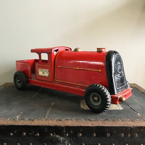 Vintage Tri-ang Express Toy Train. Finished in a glorious red colour with yellow painted details. It has two original Tri-ang Express decals on its sides - SHOP NOW - www.intovintage.co.uk