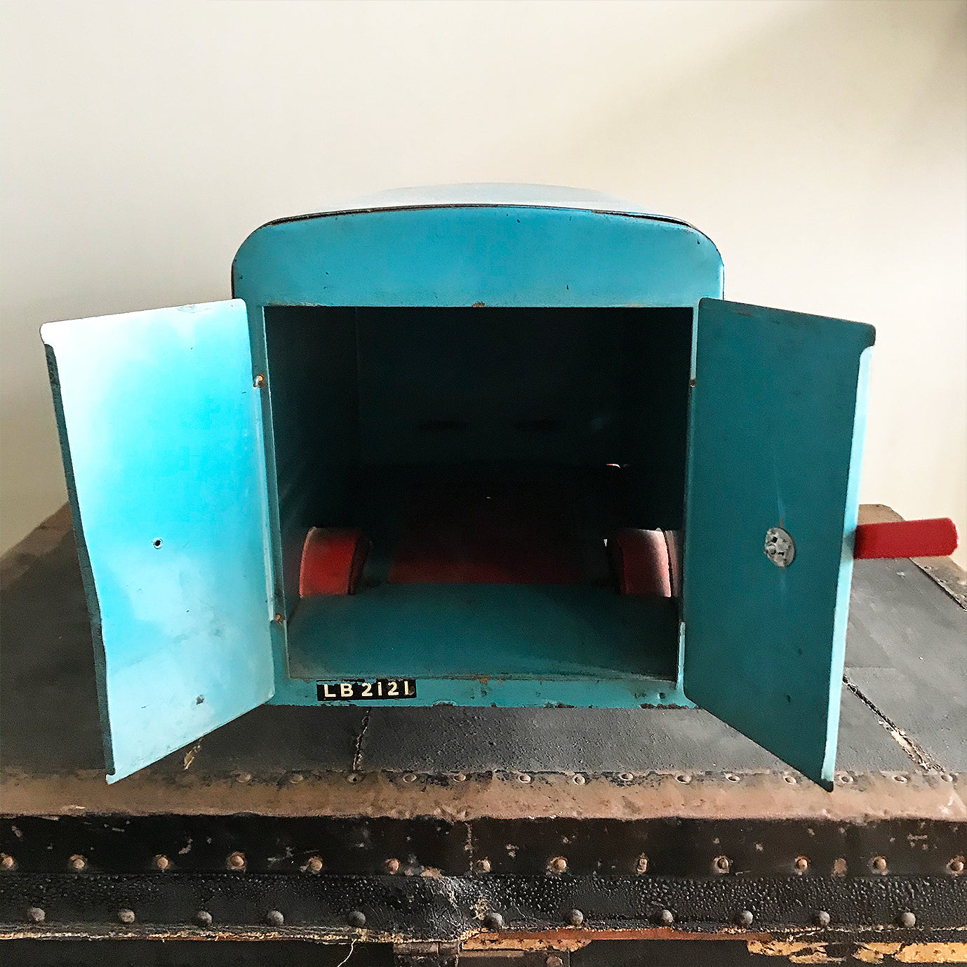 Cool Vintage Tri-ang Van No 200. The cab and wheel arches are finished in a popping red colour with the back storage section finished in a retro period light blue. It has two original Tri-ang decals on the sides and a pressed tin front radiator and lights - SHOP NOW - www.intovintage.co.uk