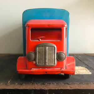 Cool Vintage Tri-ang Van No 200. The cab and wheel arches are finished in a popping red colour with the back storage section finished in a retro period light blue. It has two original Tri-ang decals on the sides and a pressed tin front radiator and lights - SHOP NOW - www.intovintage.co.uk
