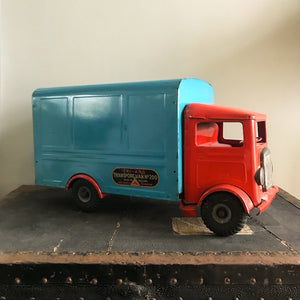 Cool Vintage Tri-ang Van No 200. The cab and wheel arches are finished in a popping red colour with the back storage section finished in a retro period light blue. It has two original Tri-ang decals on the sides and a pressed tin front radiator and lights - SHOP NOW - www.intovintage.co.uk