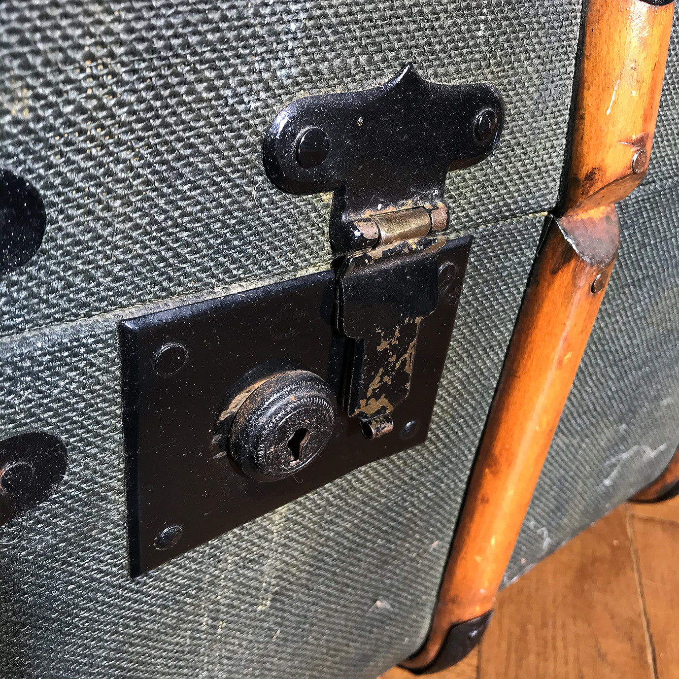 Good looking Edwardian Steamer Trunk in fantastic condition. Finished in a green applied hessian with beautifully rich bent wood straps. It has two lockable latches with a key, and a central main latch all finished in black. There are two thick leather carry handles on each end - SHOP NOW - www.intovintage.co.uk