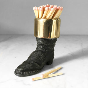 Well modelled Victorian vesta case of an old boot. Cast from metal with a brass cuff it has a striker on its sole to light your match - SHOP NOW - www.intovintage.co.uk