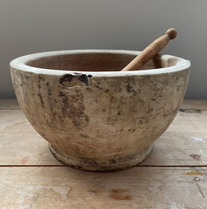 A large, time worn Mortice & Pestle in a cream stoneware. Comes with a large wooden pestle. Marked '10' on the base. A beautiful piece for the kitchen.  - SHOP NOW - www.intovintage.co.uk