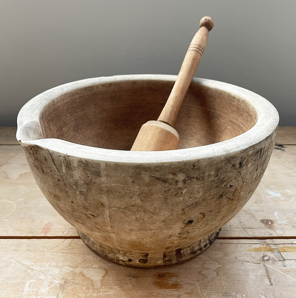 A large, time worn Mortice & Pestle in a cream stoneware. Comes with a large wooden pestle. Marked '10' on the base. A beautiful piece for the kitchen.  - SHOP NOW - www.intovintage.co.uk