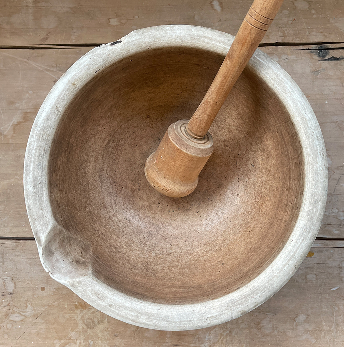 A large, time worn Mortice & Pestle in a cream stoneware. Comes with a large wooden pestle. Marked '10' on the base. A beautiful piece for the kitchen.  - SHOP NOW - www.intovintage.co.uk