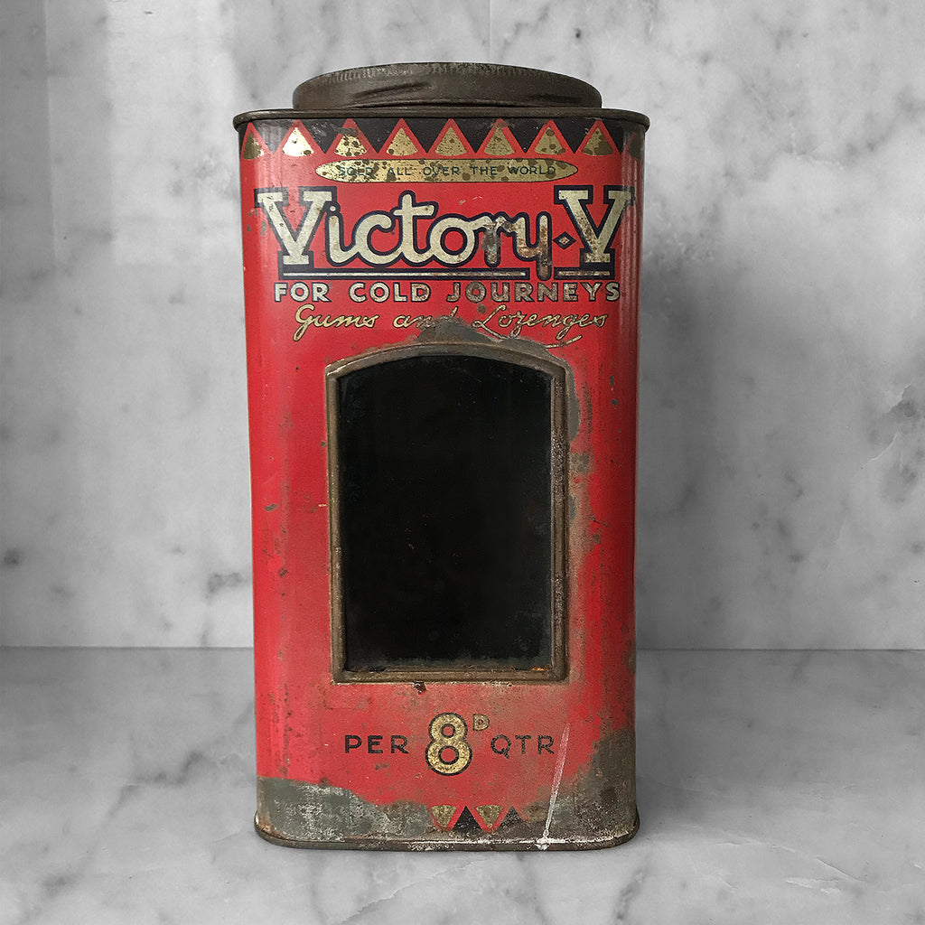 Antique Victory-V lozenge tin with glass window panel to the front, dating to around 1920. The tin has two lithographed panels to the sides, one being a fantastic image of the companies trademark sailor 'Jolly Jack', the other being an image of Horatio Nelson's Battle of Trafalgar flagship H.M.S. Victory.- SHOP NOW - www.intovintage.co.uk