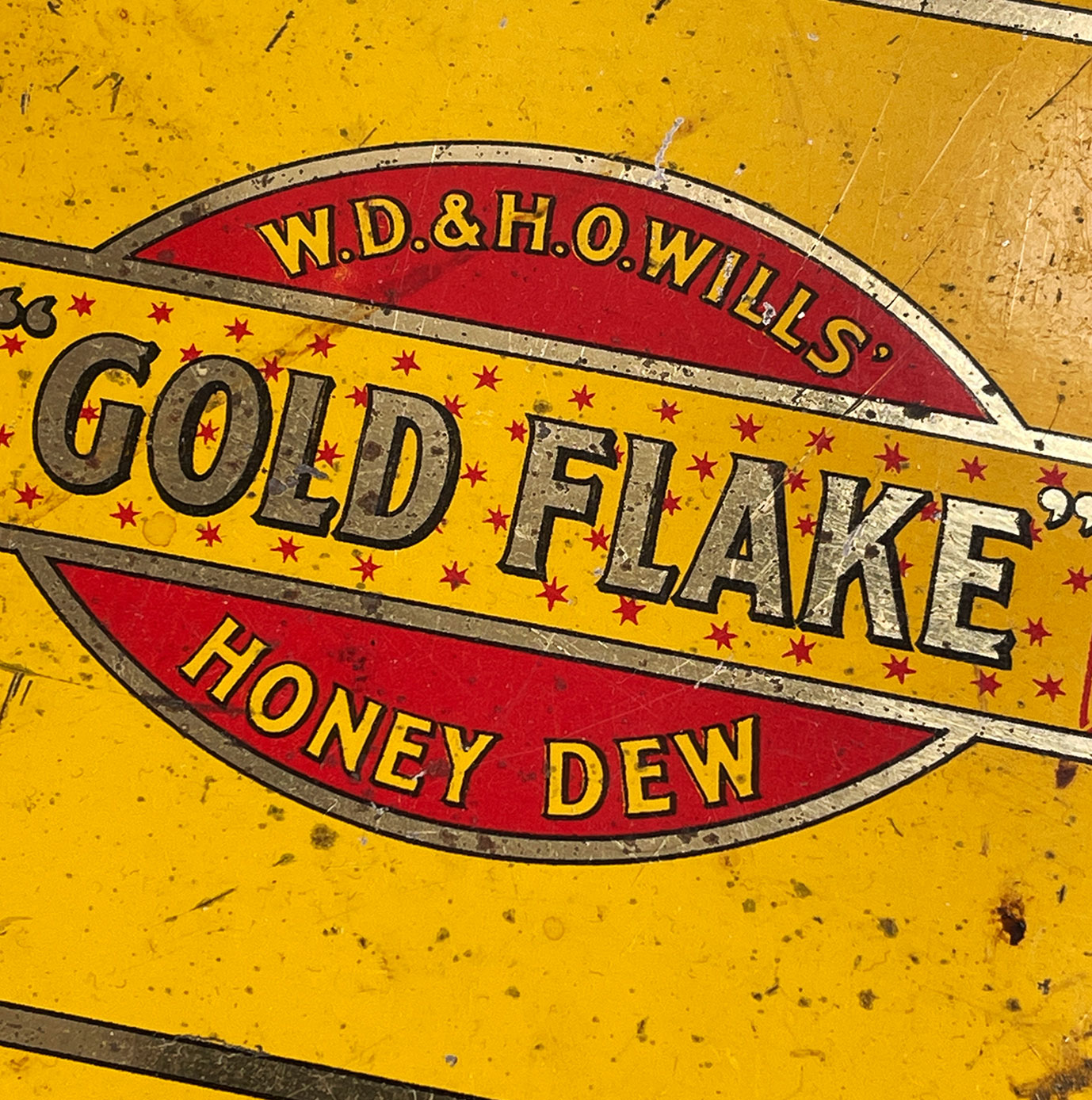 A Vintage Gold Flake Honey Dew Tobacco Tin from W.D & H.O Wills. Great colourful graphics to the front and sides with further typography to the inside lid. - SHOP NOW - www.intovintage.co.uk