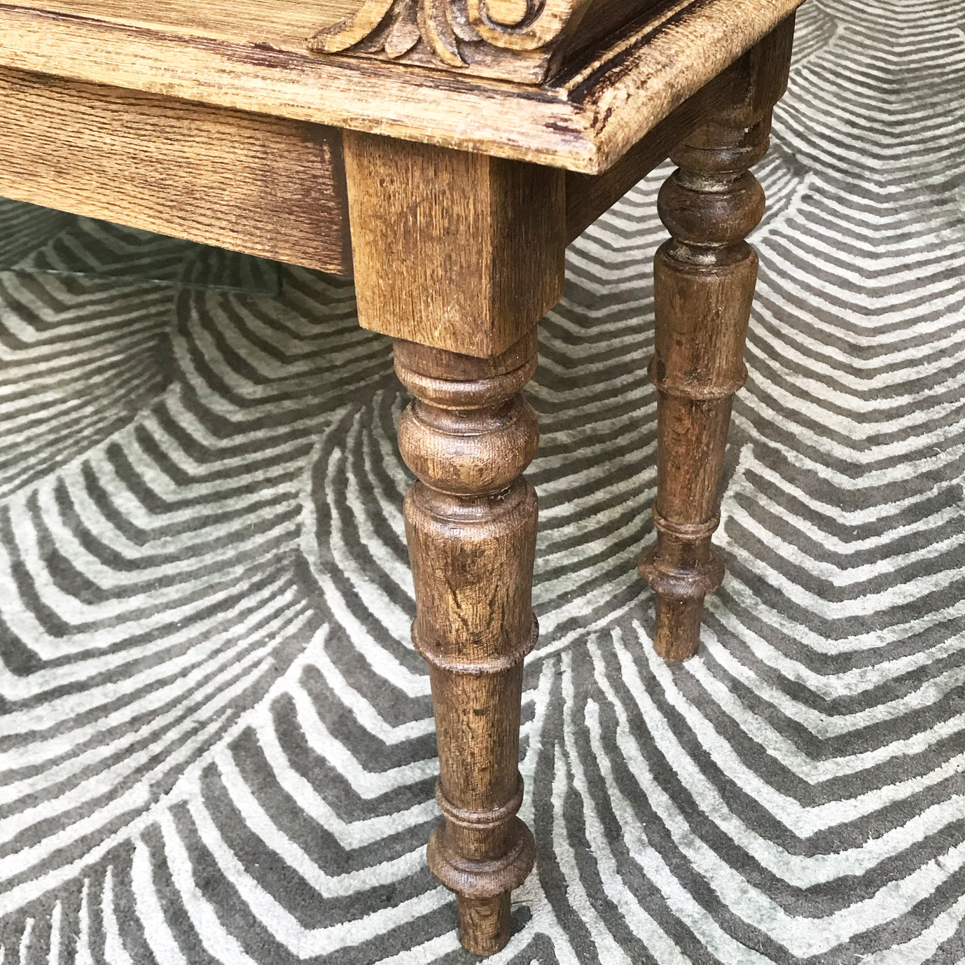 Scroll top window seat in oak. A practical and versatile size, perfect for the hallway, end of a double bed or in the bay of a window. Detailed scroll work to the top corners with good looking turned legs - SHOP NOW - www.intovintage.co.uk