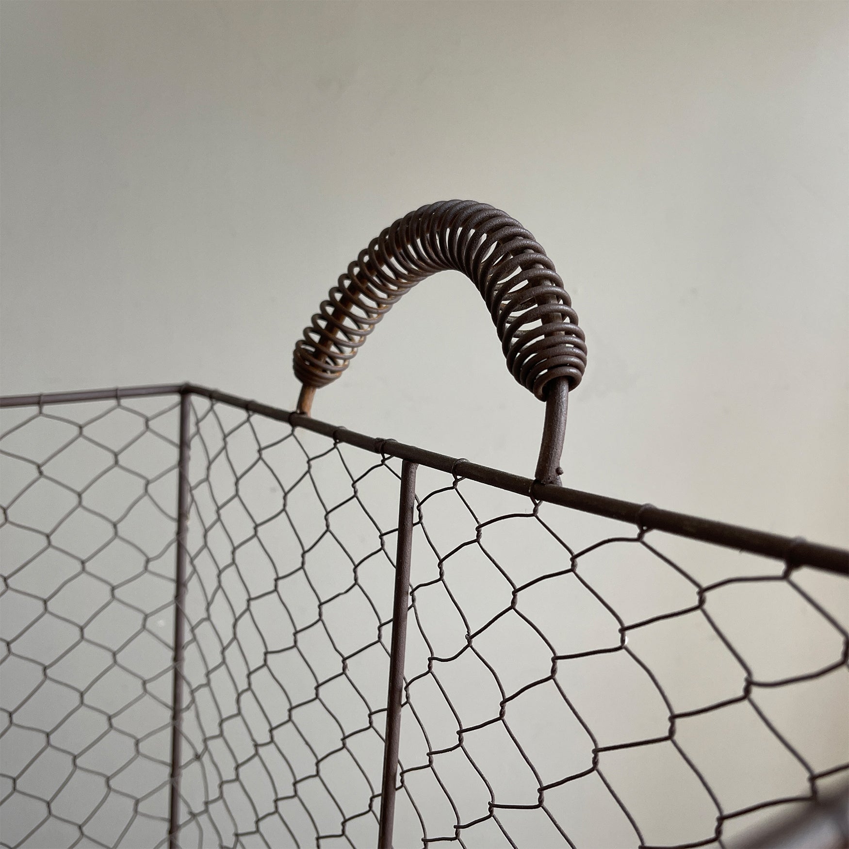 An Edwardian Wire Storage Bin