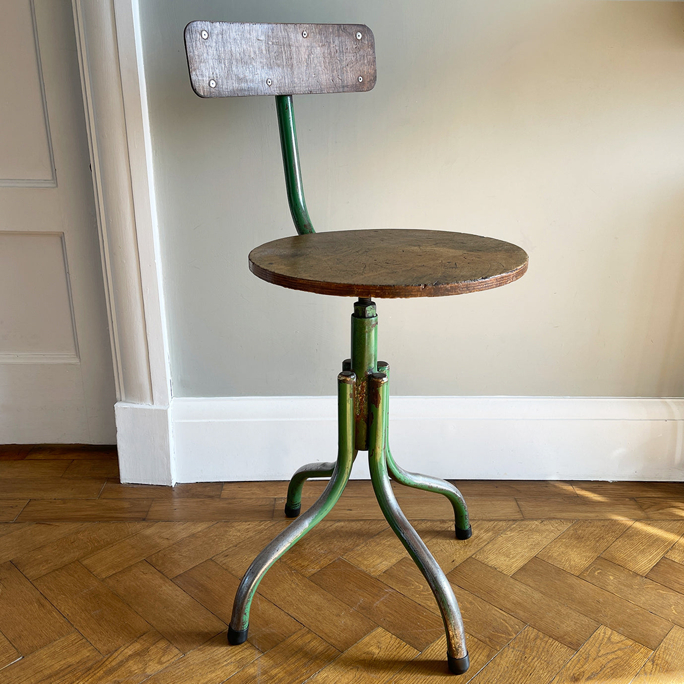 A practical Vintage Swivel Work Chair. Great age related wear to the legs where over the years someone's feet has worn away the green paint back to the bare metal. Great patina to the wooden seat with the green paint having just the right amount of ware and chips giving the chair that bang on look. - SHOP NOW - www.intovintage.co.uk