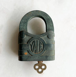 A large vintage Yale Brass Padlock with a wonderful verdigris finish to the brass. Very solid with a satisfying clunk when locked. Fully working with original key - SHOP NOW - www.intovintage.co.uk