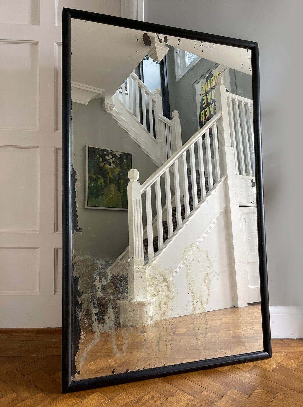 An impressive large and heavily foxed vintage mirror with a waxed black ebonised wooden frame - SHOP NOW - www.intovintage.co.uk