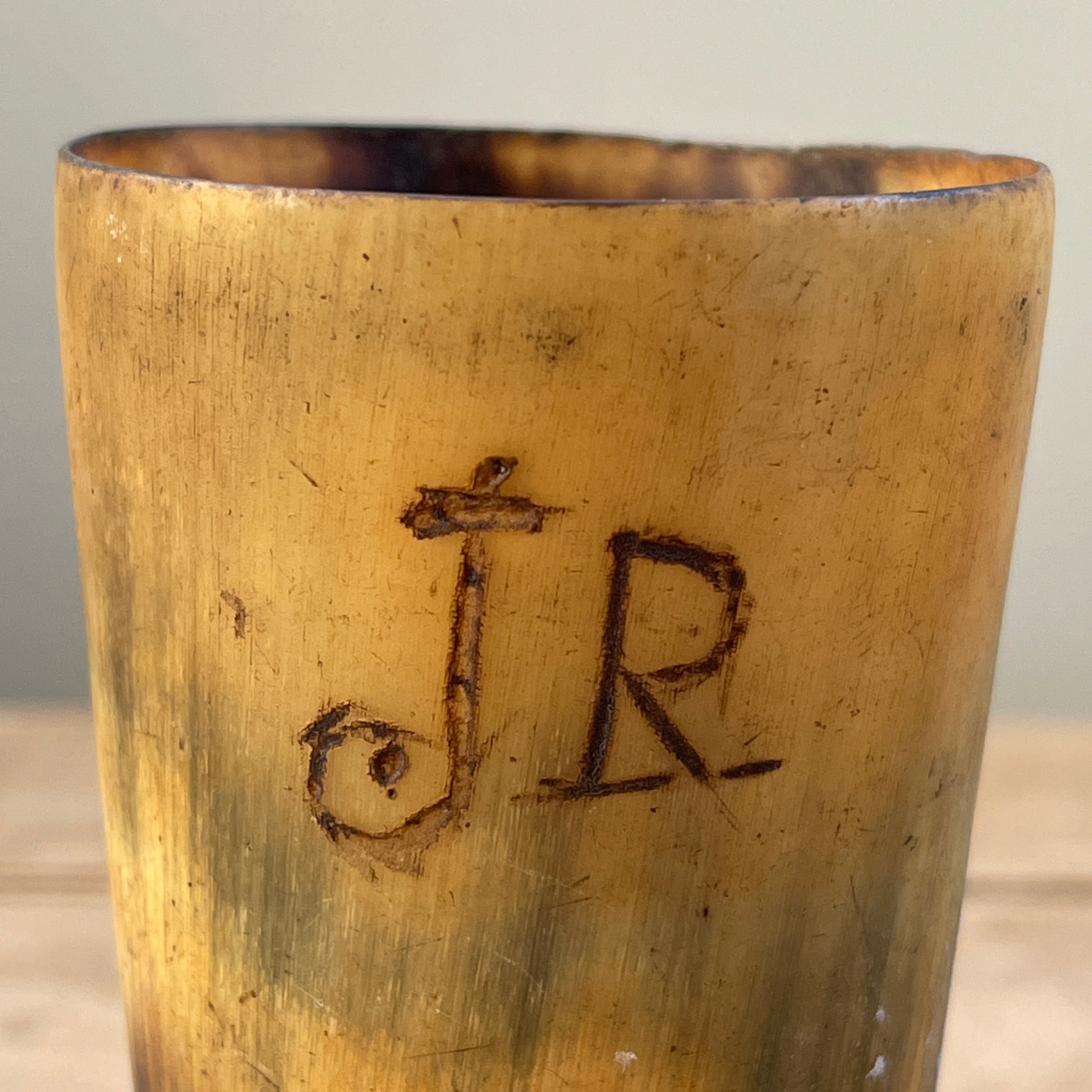 A collection of Six 18th Century Horn Drinking Vessels with two having the dotted inscriptions of 'J.R'. The largest cup has two inscriptions, font and back. There are four lager cups with two shot sized cups - SHOP NOW - www.intovintage.co.uk