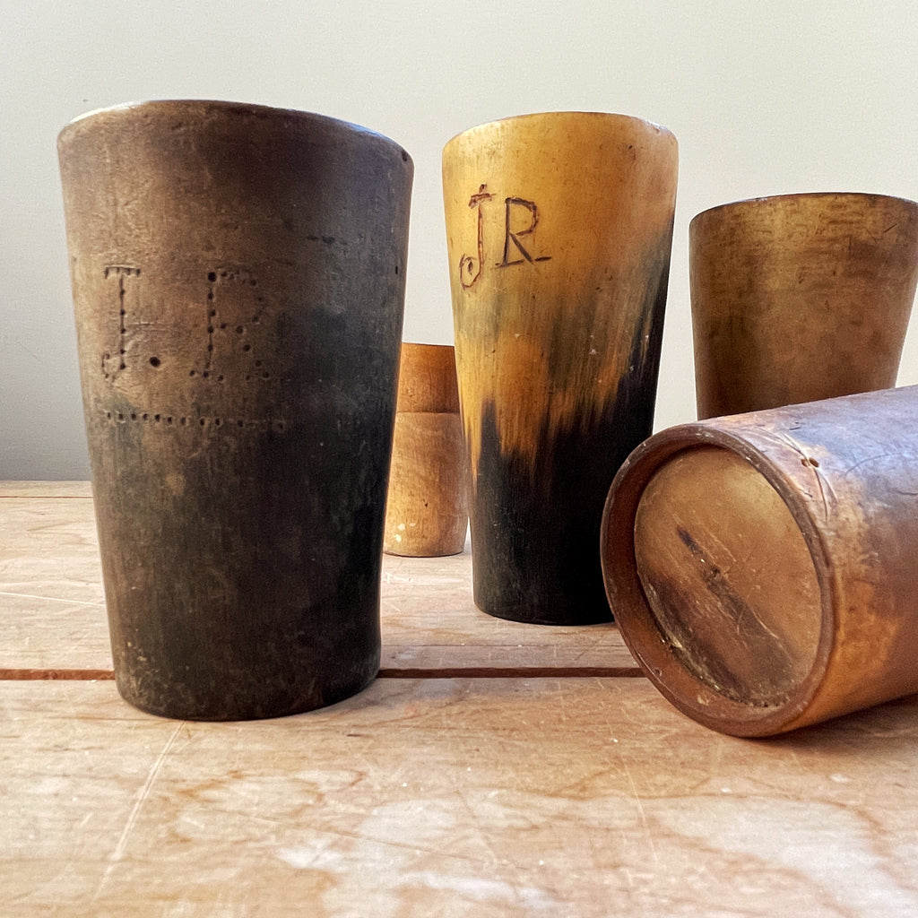 A collection of Six 18th Century Horn Drinking Vessels with two having the dotted inscriptions of 'J.R'. The largest cup has two inscriptions, font and back. There are four lager cups with two shot sized cups - SHOP NOW - www.intovintage.co.uk