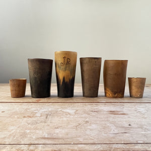 A collection of Six 18th Century Horn Drinking Vessels with two having the dotted inscriptions of 'J.R'. The largest cup has two inscriptions, font and back. There are four lager cups with two shot sized cups - SHOP NOW - www.intovintage.co.uk