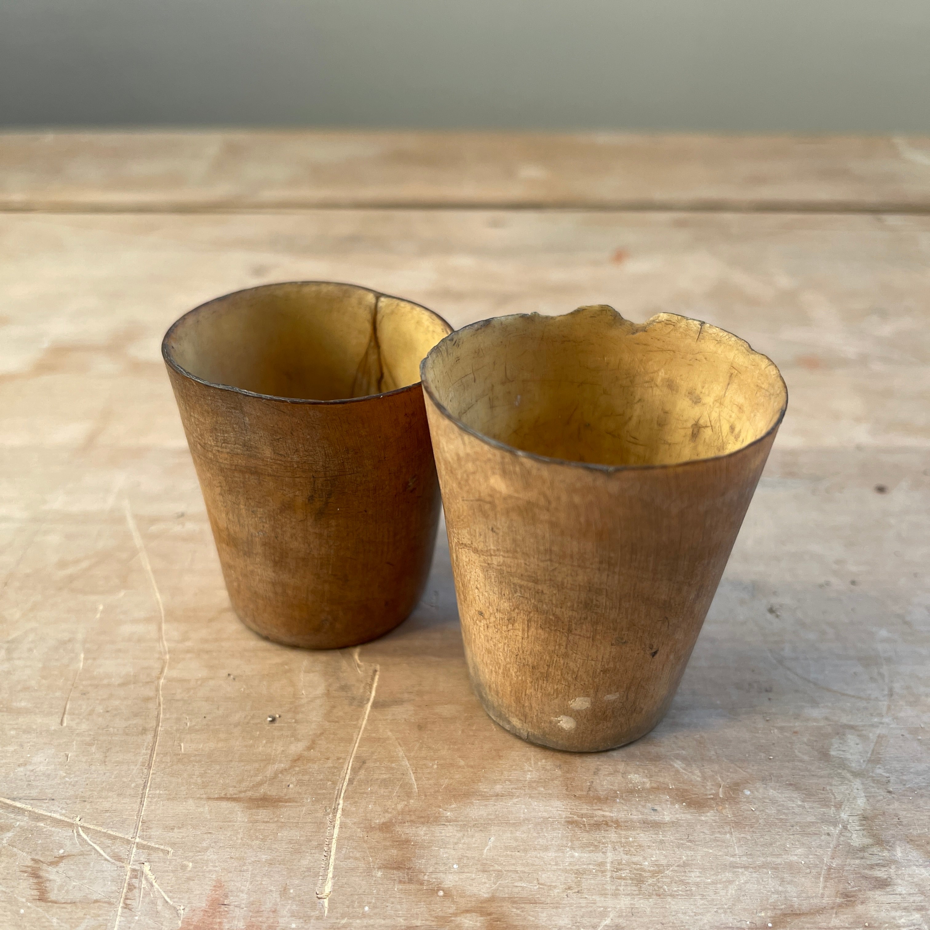 A collection of Six 18th Century Horn Drinking Vessels with two having the dotted inscriptions of 'J.R'. The largest cup has two inscriptions, font and back. There are four lager cups with two shot sized cups - SHOP NOW - www.intovintage.co.uk