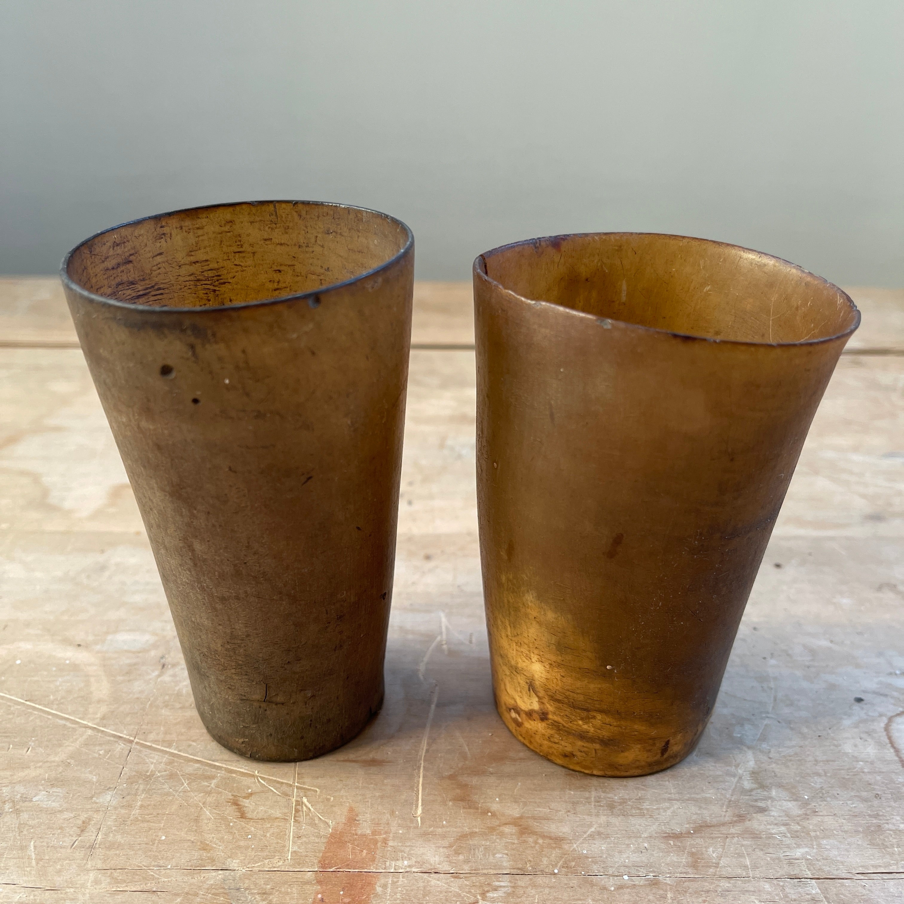 A collection of Six 18th Century Horn Drinking Vessels with two having the dotted inscriptions of 'J.R'. The largest cup has two inscriptions, font and back. There are four lager cups with two shot sized cups - SHOP NOW - www.intovintage.co.uk